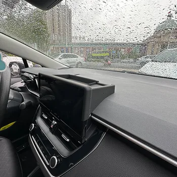 Скрит чекмедже за съхранение на Централната конзола на Таблото разполага Навигационния екран Навигационния екран, за да Toyota За Corolla 2023 Изображение 2