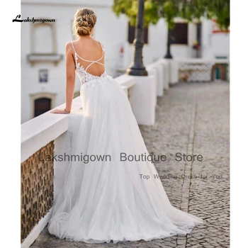 Плажна рокля сватба Bruidsjurk Лято 2023, Сексуална сватбена рокля от бял Тюл, Дълги сватбени рокли в стил Бохо, Дантелени апликации с отворен гръб. Изображение 2